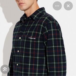 This is a COACH plaid flannel shirt BNWT size xs ..